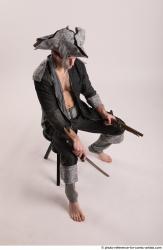 JACK PIRATE SITTING POSE WITH GUN AND DAGGER